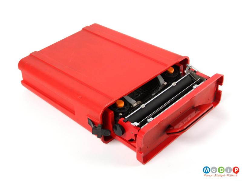 Top view of a Valentine typewriter showing the main body inside the protective carry case.