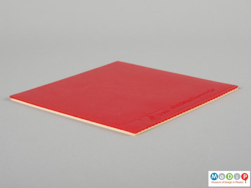 Side view of a table tennis rubber showing the different layers.