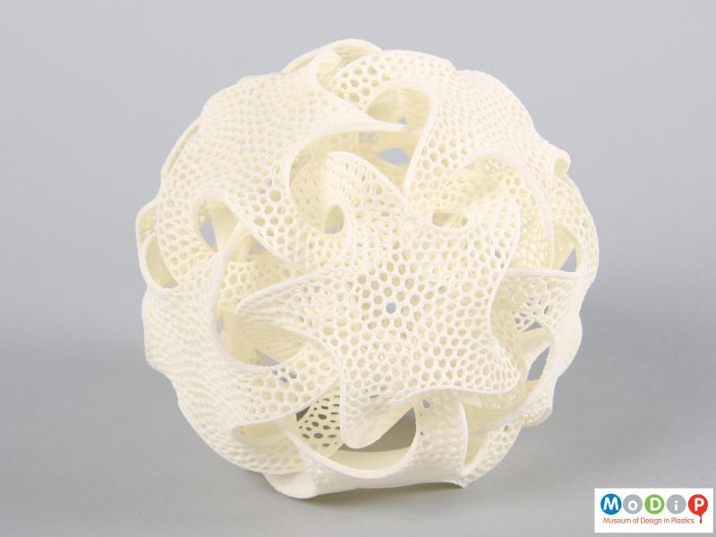 Side view of a lampshade showing the intricate pattern.