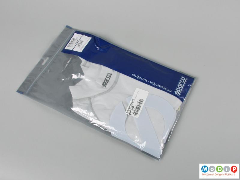 Front view of a shirt showing the packaging.