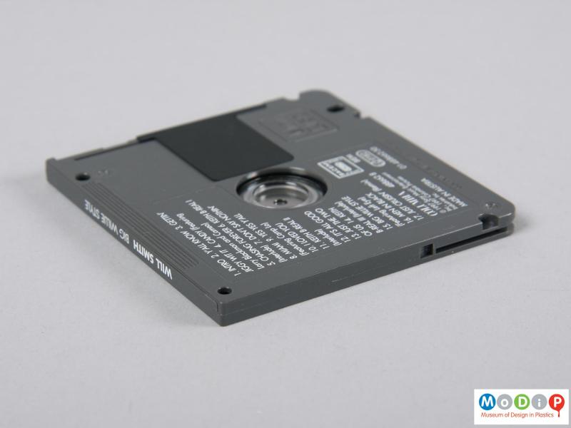 Side view of a MiniDisc showing the depth of the cartridge.