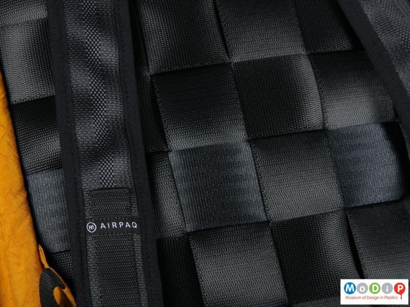 Close view of a backpack showing the woven webbing.