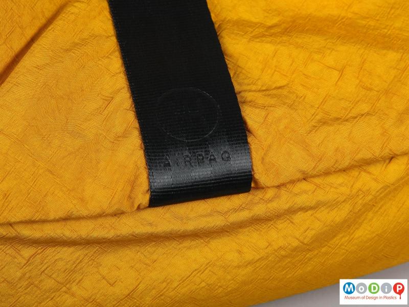 Close view of a backpack showing the logo.