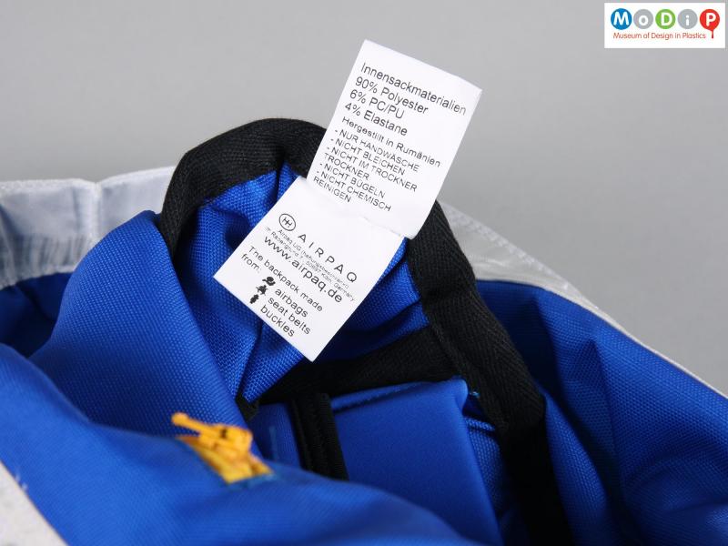 Close view of a backpack showing the label.