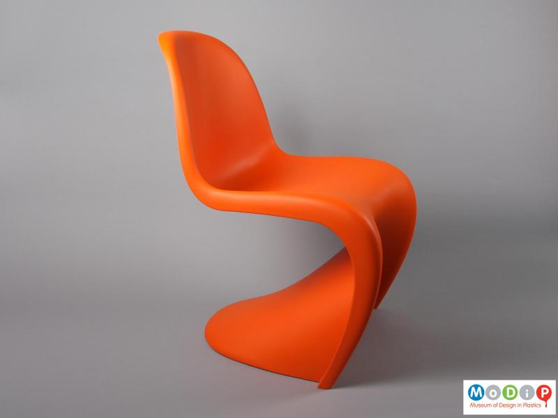 Side view of a chair showing the s shape.