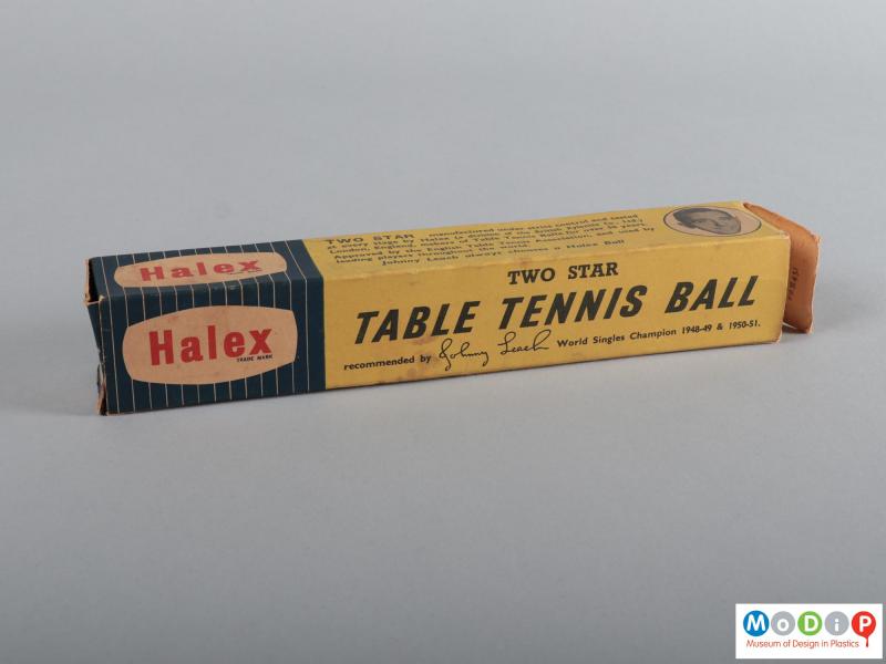 Side view of a box of table tennis balls showing the packaging.