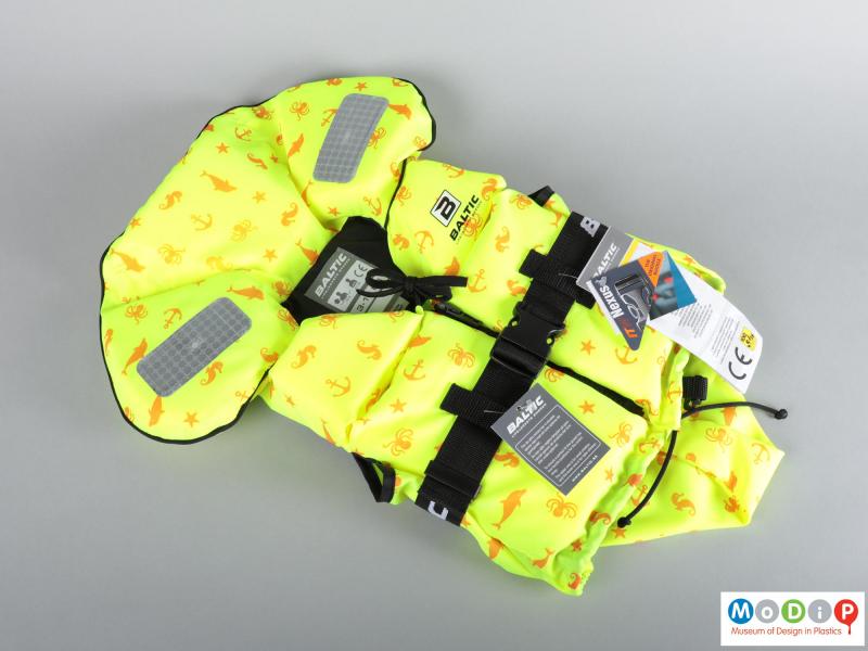Front view of a life jacket showing the swim suit style fitting.