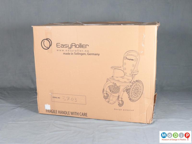 Side view of a wheelchair showing the box.