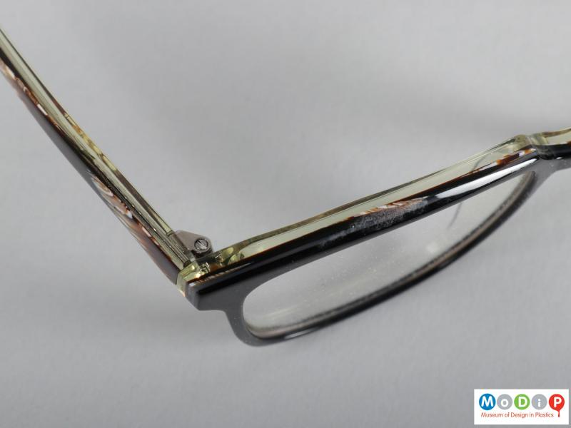 Close view of a pair of glasses showing the clear rear section of the frame.
