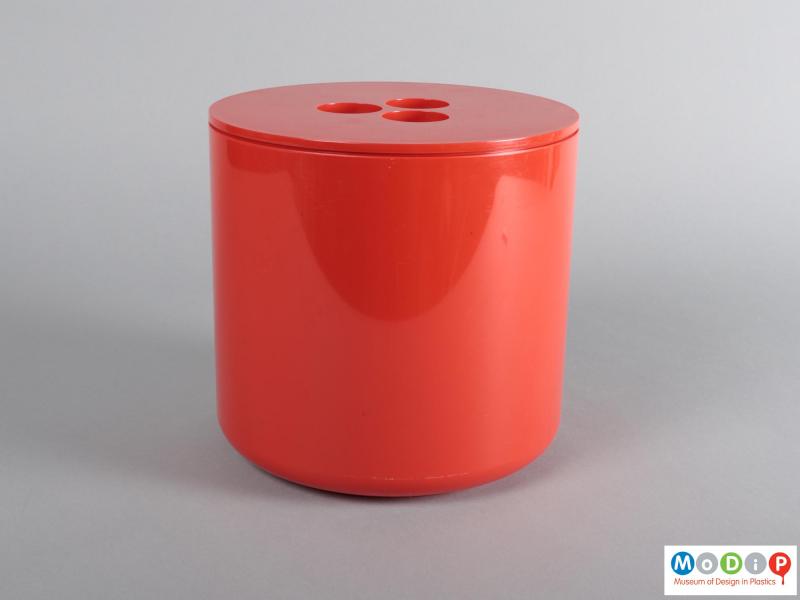 Side view of an ice bucket showing the cylindrical shape.