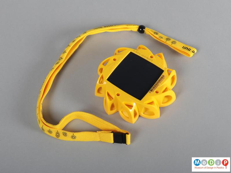 Rear view of a light showing the solar panel and the lanyard.