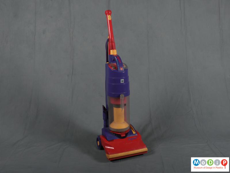 Front view of a vacuum cleaner showing the upright shape.