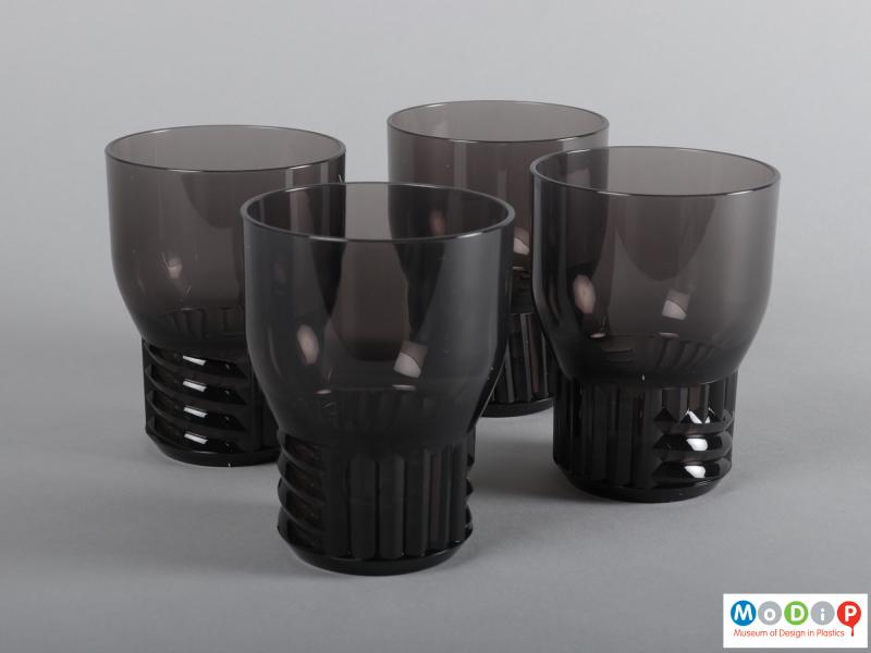 Side view of a set of beakers showing all four.