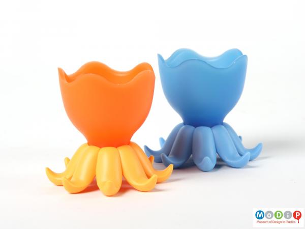 Side view of a pair of Living Gear octopus egg cups showing both cups standing on their bases.