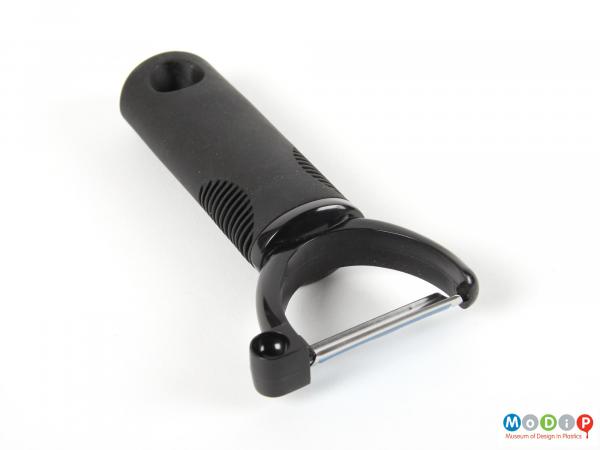 Top view of a Smart Design vegetable peeler showing the handle and the blade.