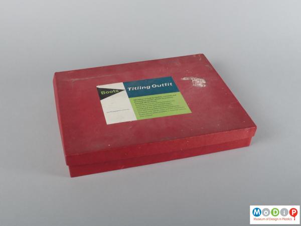 Side view of a titling set showing the storage box.