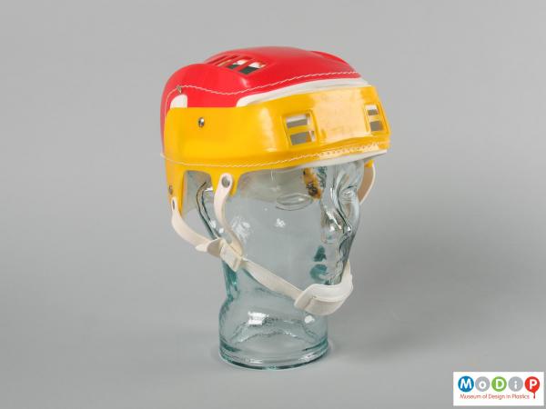 Front view of a helmet showing the chin strap.