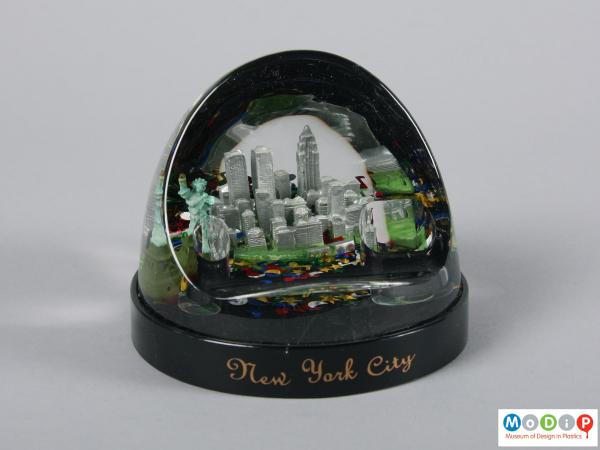 Front view of a snow globe showing the New York cityscape.