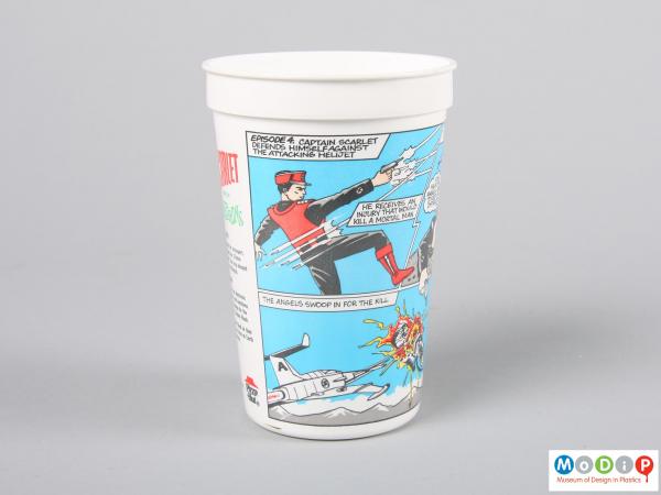 Side view of a Pizza Hut beaker showing the printed image.