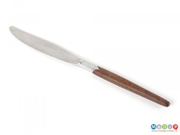 Top view of a knife showing the long slender handle.