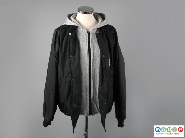 Front view of a jacket showing the contrasting central / hood fabric and that of the main body.