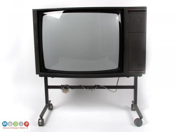 Front view of a Bang and Olufsen TV showing the square screen with controll panel on one side.