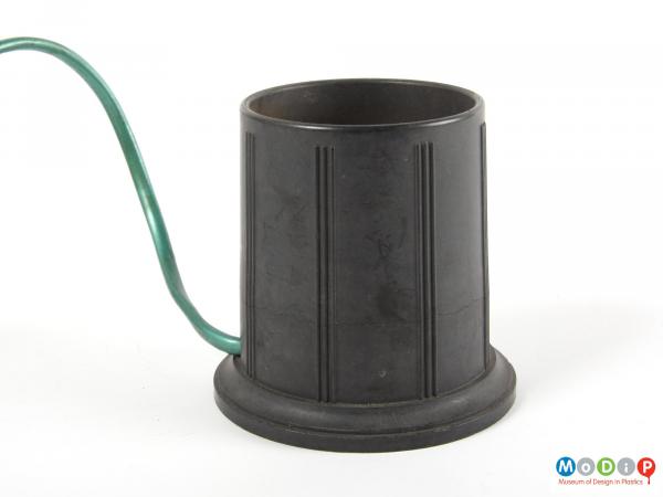 Side view of a bottle warmer showing the moulded line decoration.