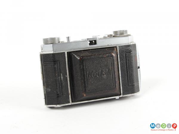 Frontview of a camera showing the lens cover closed.