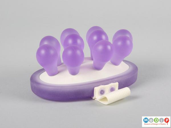 Side view of a massager showing the 10 bobbles.