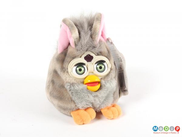 Front view of a Furby showing the face.