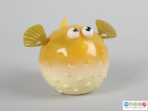 Front view of a bath toy showing the side fins and facial features.