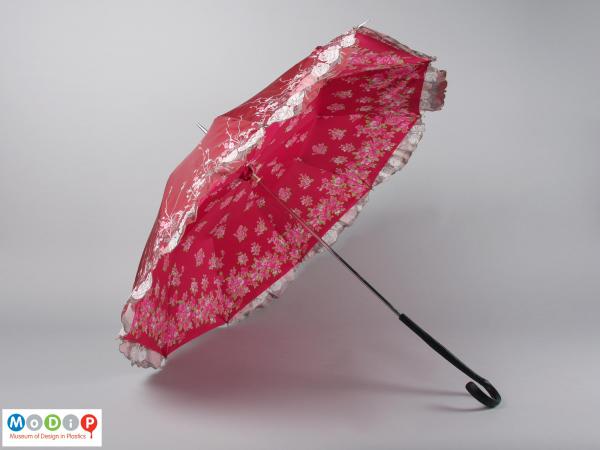 Side view of an umbrella showing the canopy.