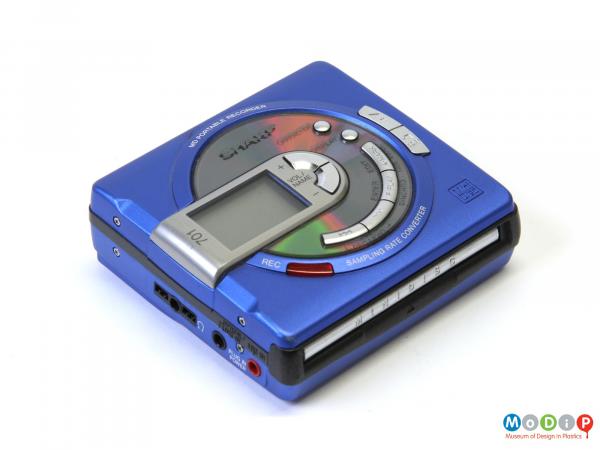 Side view of a MiniDisc player showing the control buttons on the front.