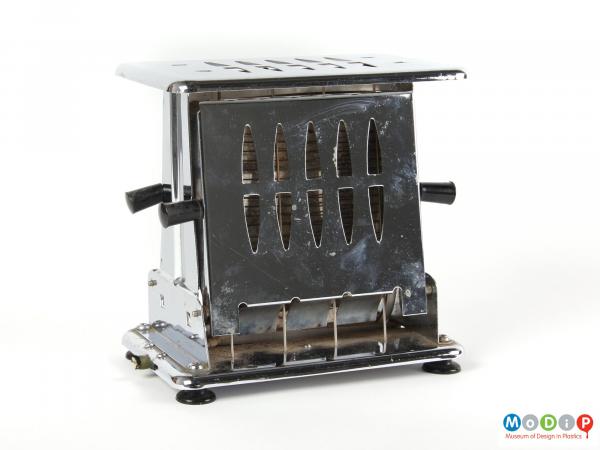 Side view of a Kenwood toaster showingthe flat top and sides with vents in to allow any steam to escape.