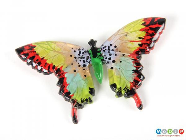 Front view of a butterfly brooch showing the shape of the wings and body.