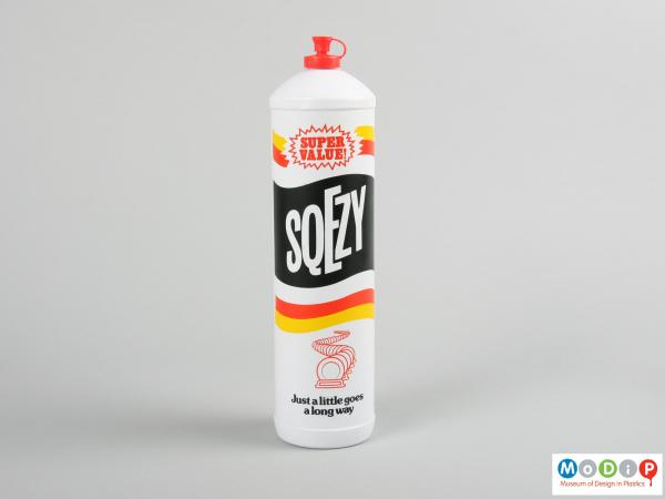 Front view of a Sqezy bottle showing the printed design.