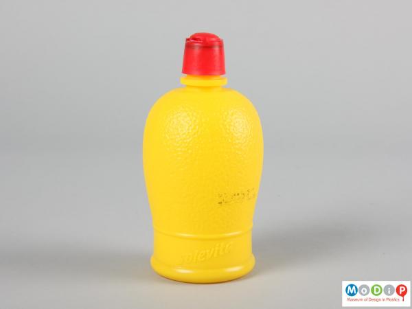 Side view of a lemon juice bottle showing the moulded texture in the body.