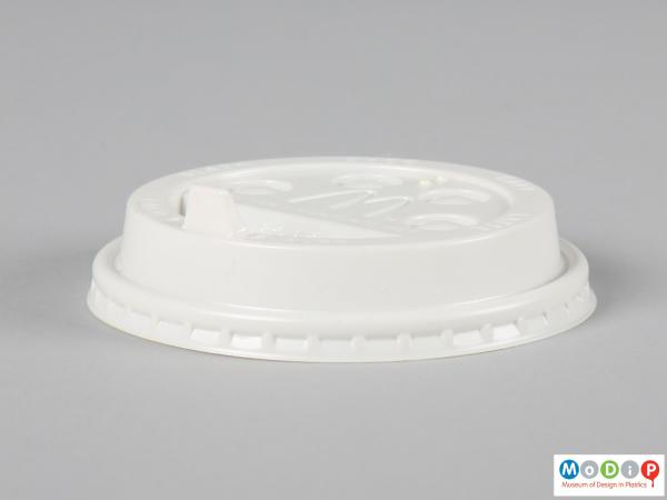 Side view of a hot drink lid showing the stright sides and flexible seal.