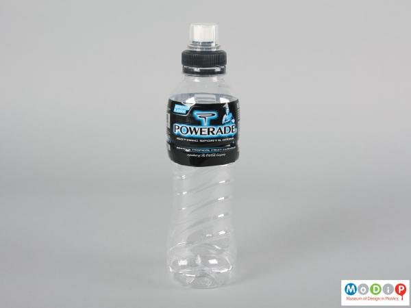 Side view of a Powerade bottle showing the moulded grip in the body.