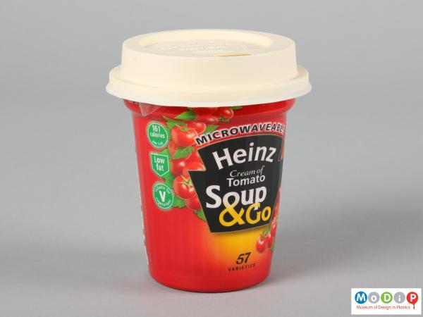 Side view of a Soup & Go cup showing the tapered sides and fitted lid.