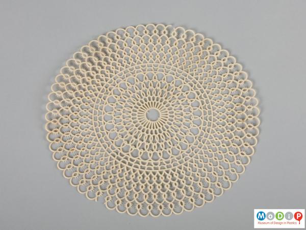 Top view of a table mat showing the intricate pattern.