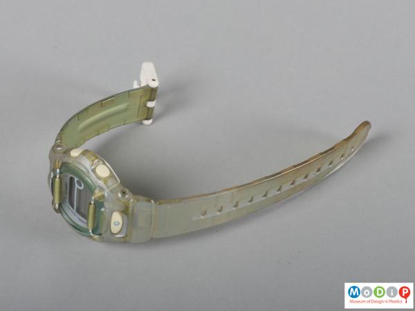 Side view of a watch showing the strap and face.