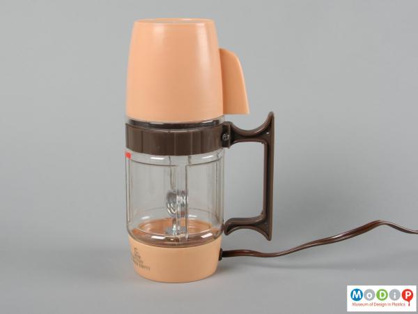 Side view of a coffee maker showing the straight handle.