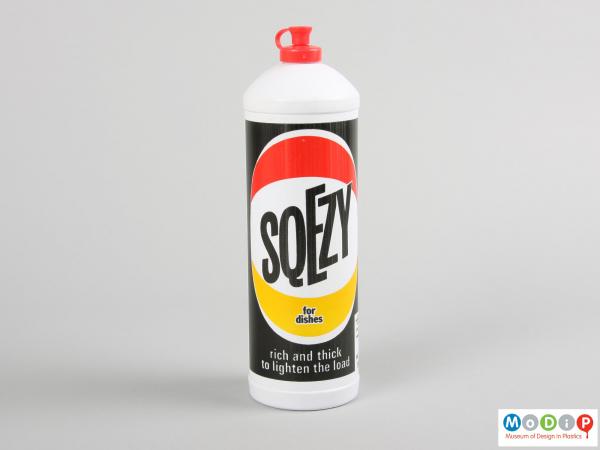 Front view of a Sqezy bottle showing the printed design.