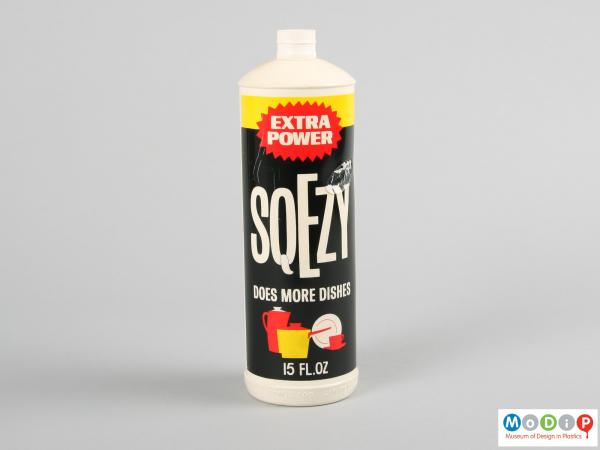 Front view of a Sqezy bottle showing the printed design.