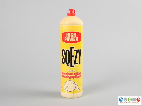 Front view of a Sqezy bottle showing the printed design.