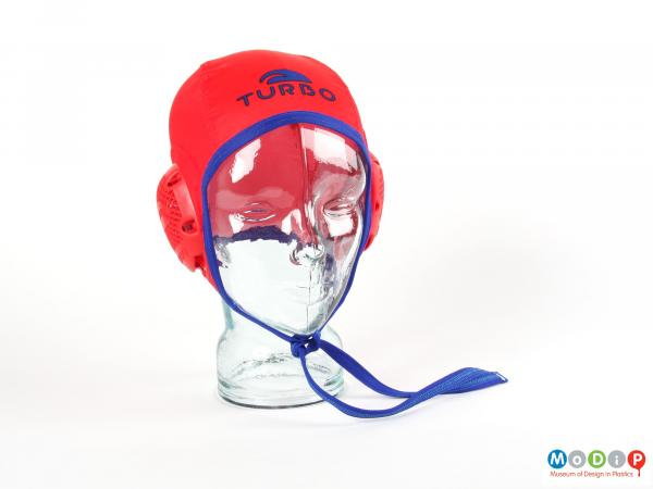 Front view of a water polo cap showing close fitting anture of the cap.