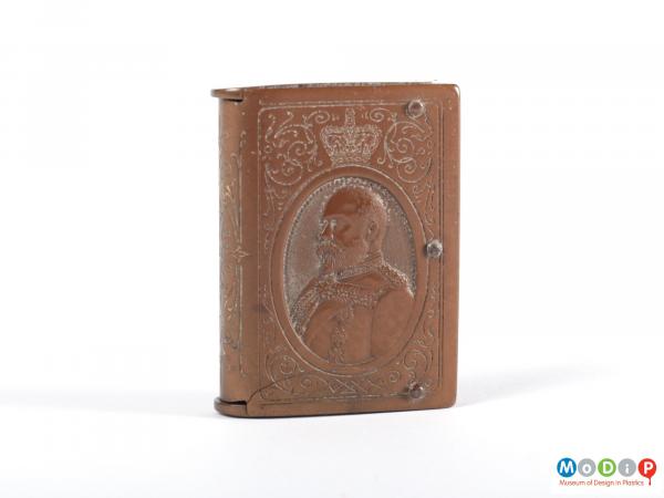 Front view of a vesta case showing the moulded portrait image of King Edward VII.