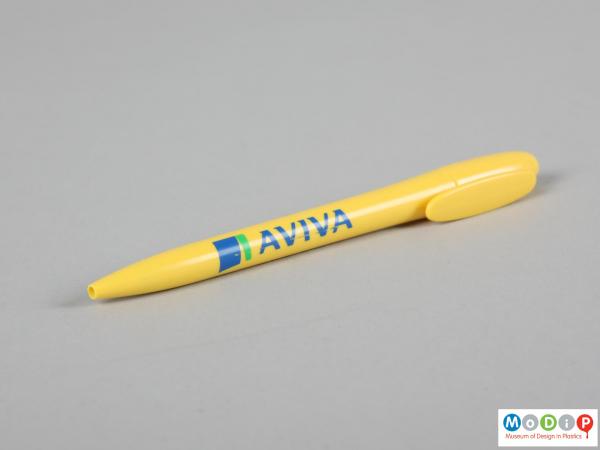 Side view of a pen showing the printed inscription.