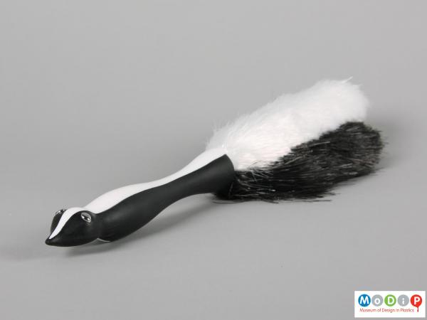 Side view of a brush showing the moulded body shape of the handle.
